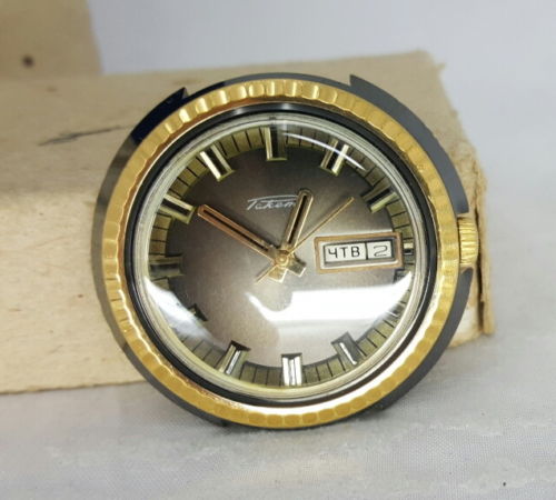 Raketa golden shockproof watch with calendar day+date 1